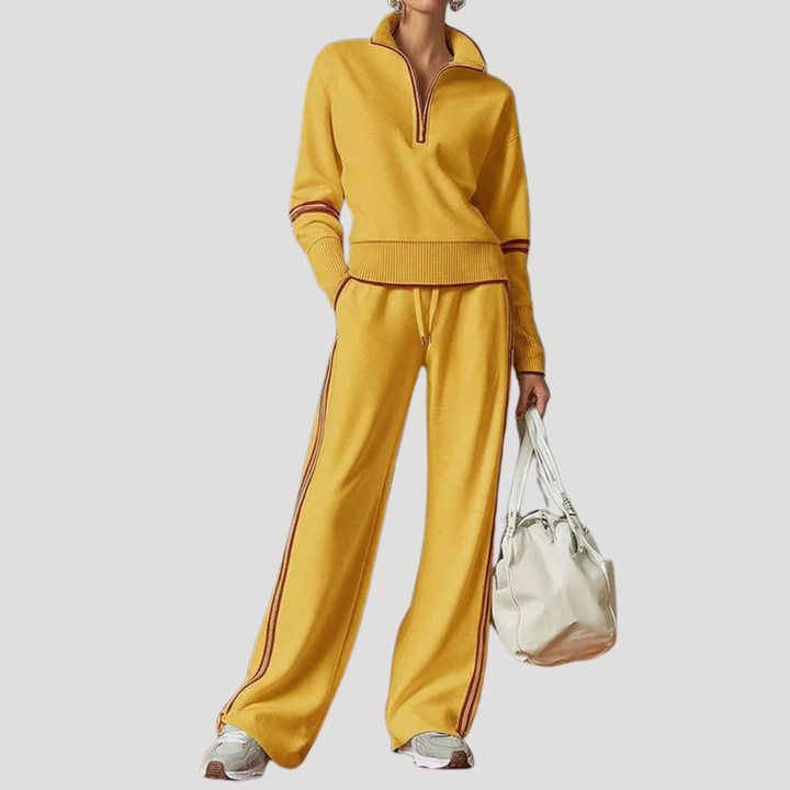 Tenue femme en maille confortable avec col zippé et pantalon large. Look moderne et décontracté chic.