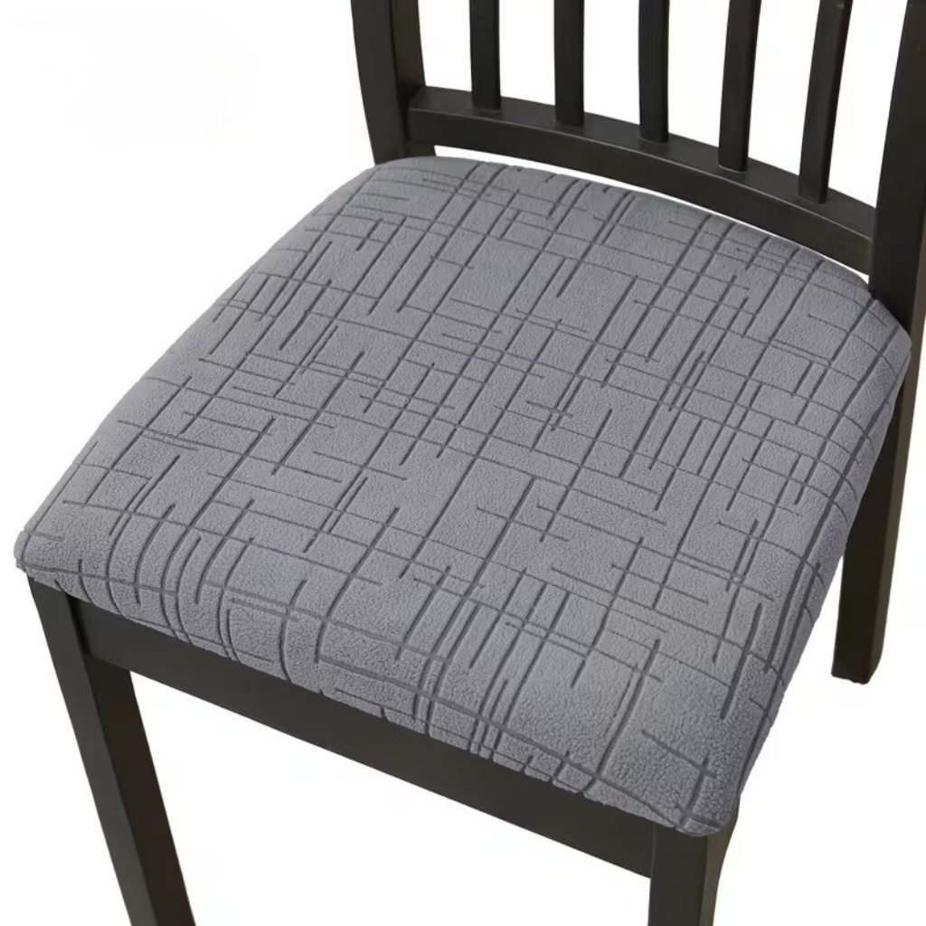 Protection de chaise design moderne, housse élastique adaptable pour un ameublement chic et fonctionnel.
