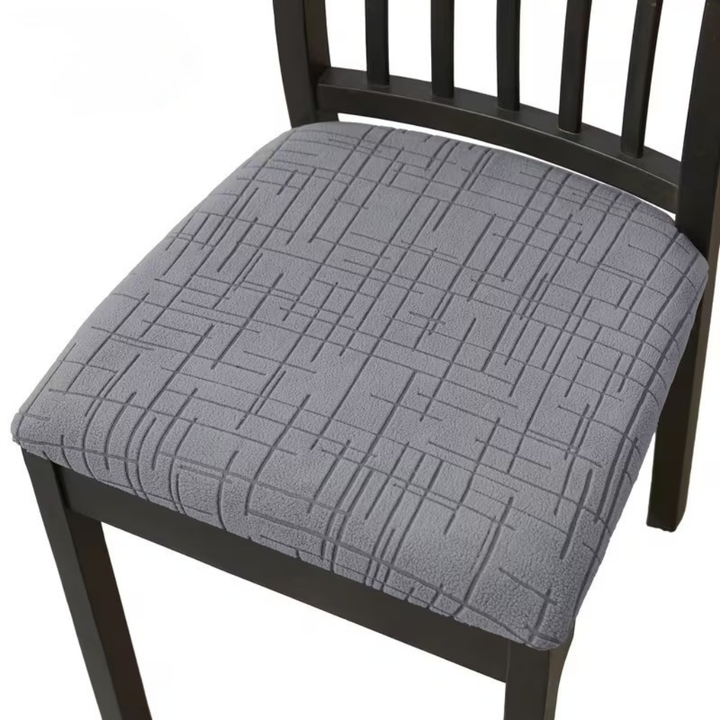 Protection de chaise design moderne, housse élastique adaptable pour un ameublement chic et fonctionnel.