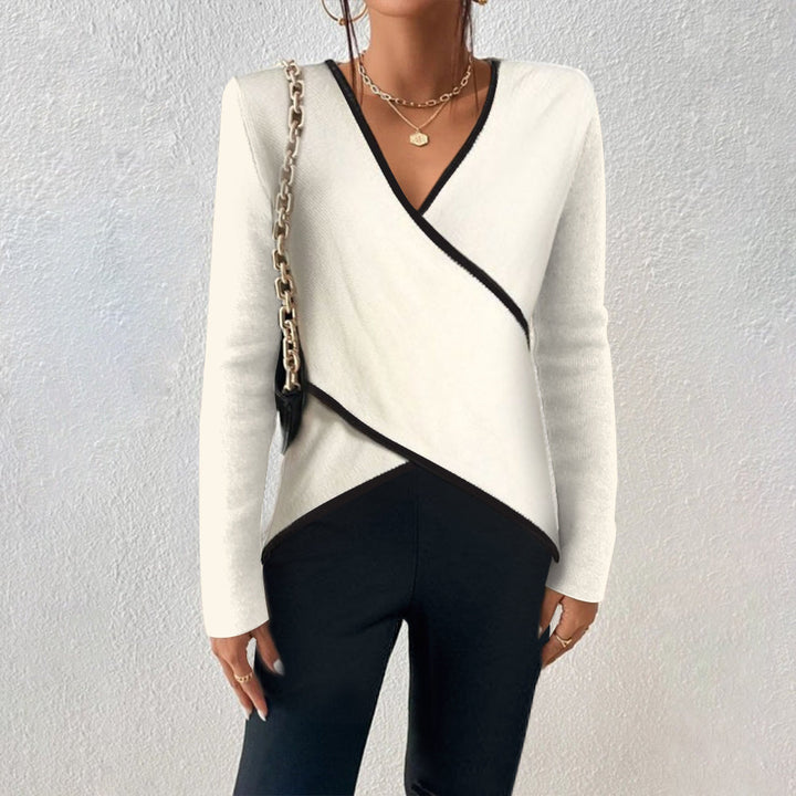 Pull femme élégant en tricot, col en V, idéal pour un look chic et confortable en automne-hiver.