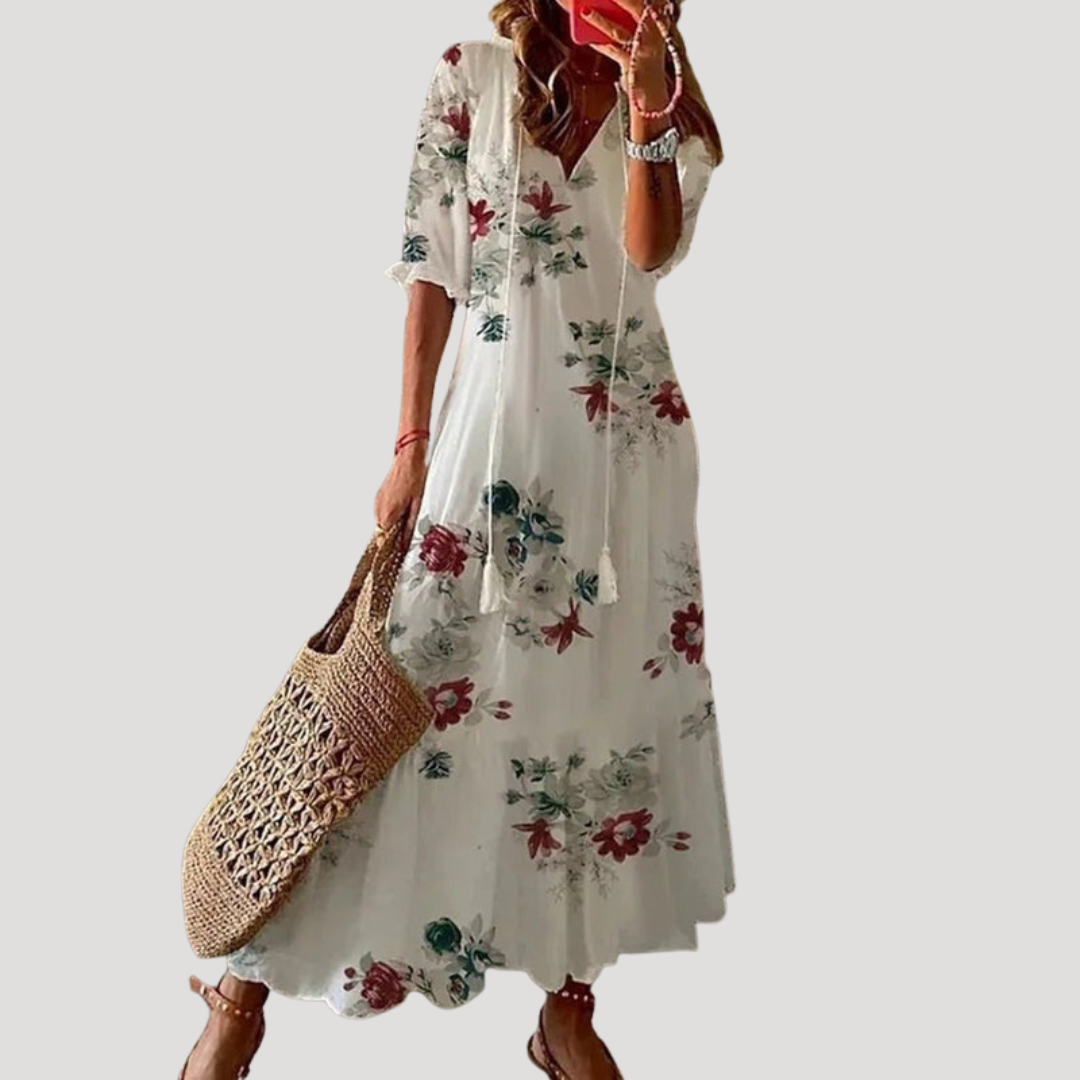 Robe bohème longue et fluide pour femme, tissu léger et motif unique, confort optimal pour l'été.