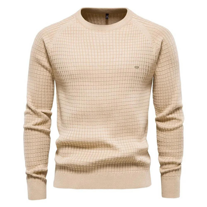Pull homme polyvalent à col rond bleu marine. Style classique et essentiel pour votre garde-robe d'automne-hiver.
