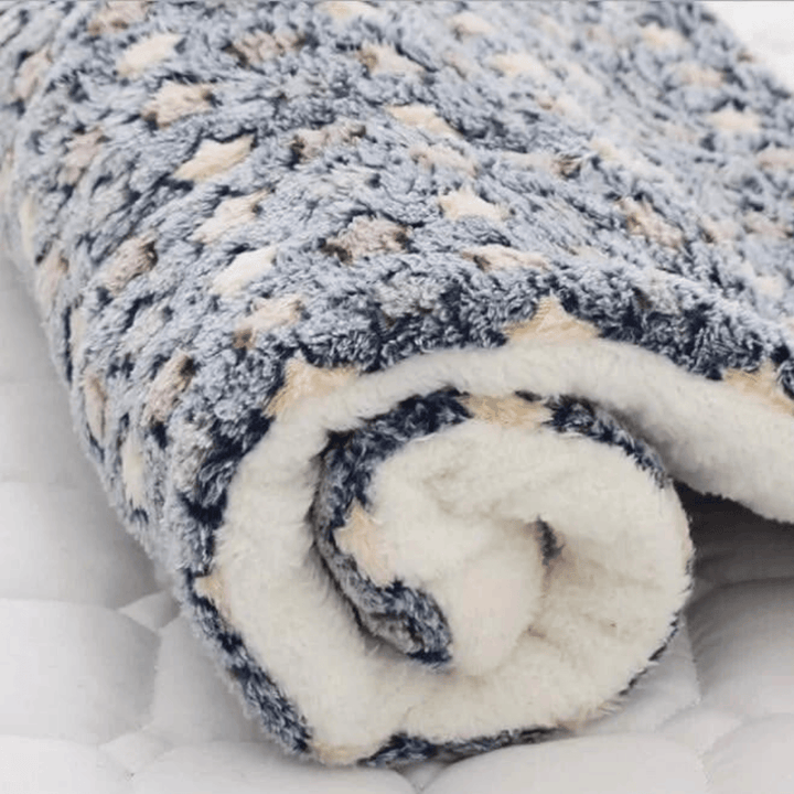 Variété de couleurs disponibles pour la couverture apaisante, garantissant un doux confort anti-stress.