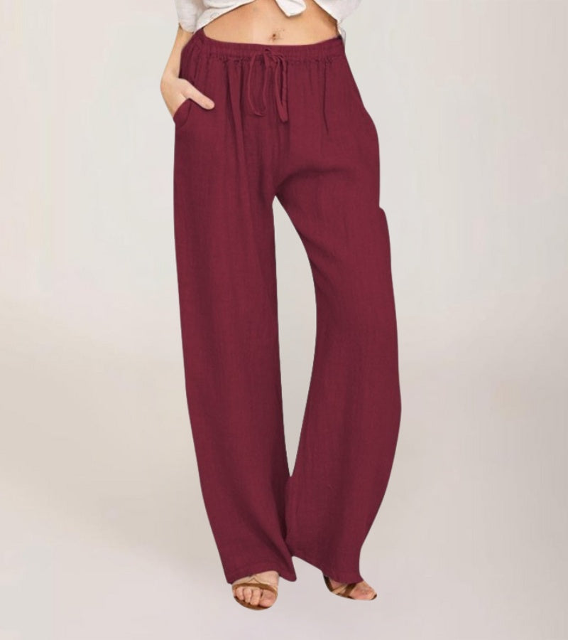 Vue de face d'un pantalon large femme taille haute en lin, décontracté, léger, idéal pour l'été.