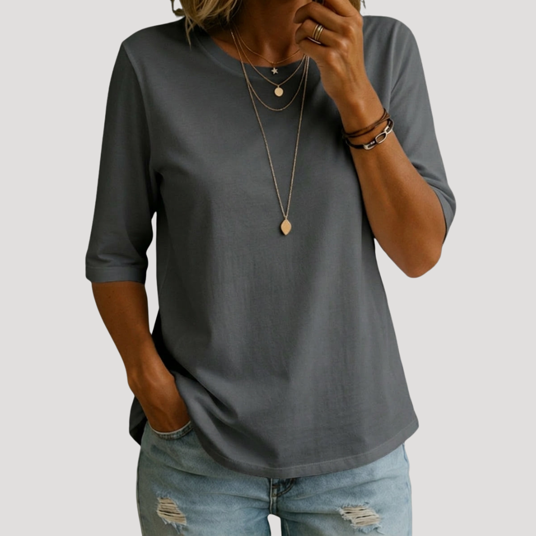 T-shirt femme moderne à manches 3/4, col rond. Parfait pour une mode été casual et élégante.
