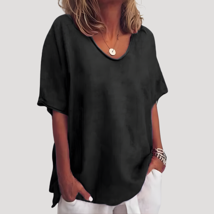 T-shirt femme décontracté à col rond, coupe ample et manches courtes pour un confort maximal au quotidien.