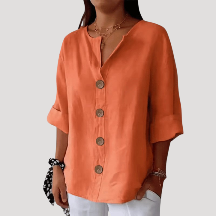 Blouse femme boutonnée, col V. Confort et élégance pour une tenue mode et décontractée toutes saisons.