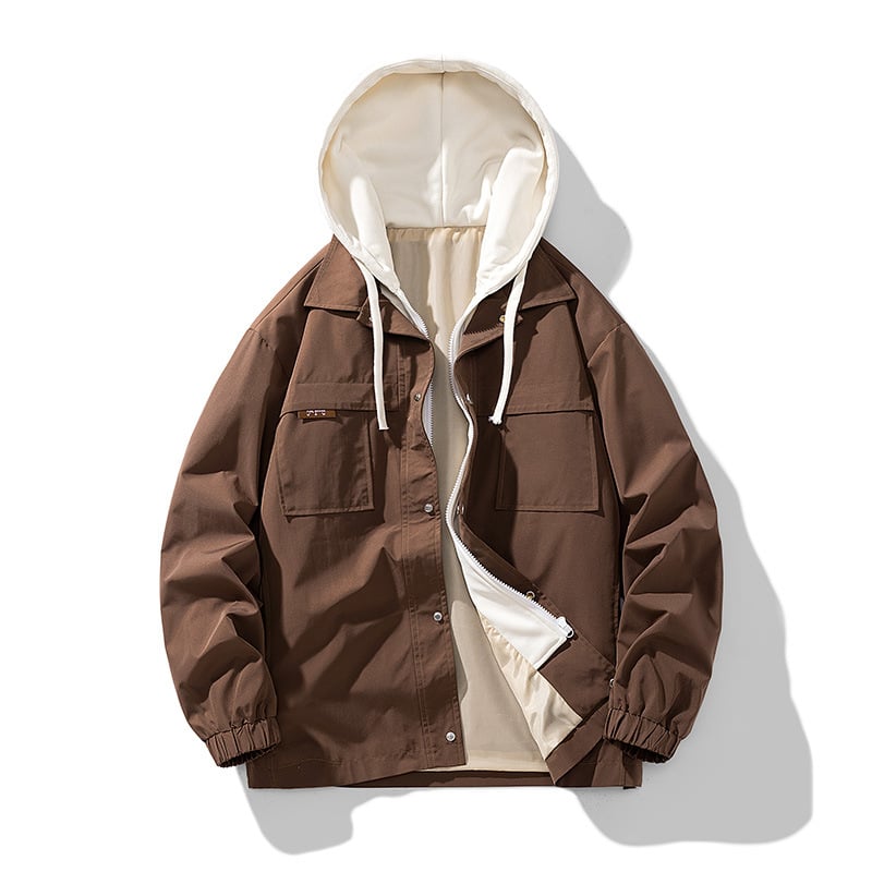 Veste homme noire légère et respirante, style urbain décontracté. Confort optimal pour la mi-saison, avec capuche.