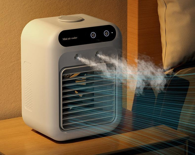 Appareil de climatisation mini portable pour une fraîcheur rapide et ciblée à la maison ou au travail. Silencieux, efficace.