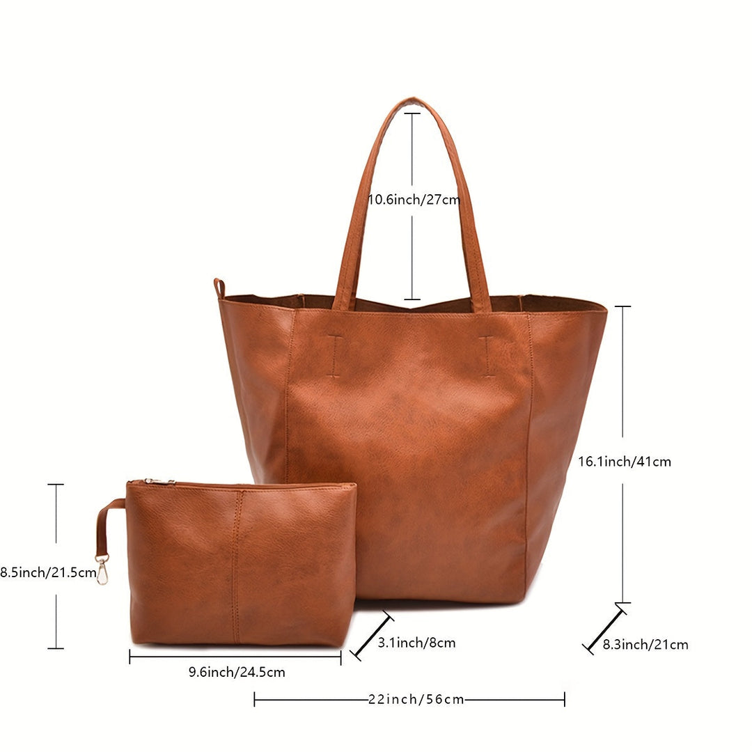 Détail des anses confortables du sac tote élégant en simili cuir doux, grand sac pratique pour femme.
