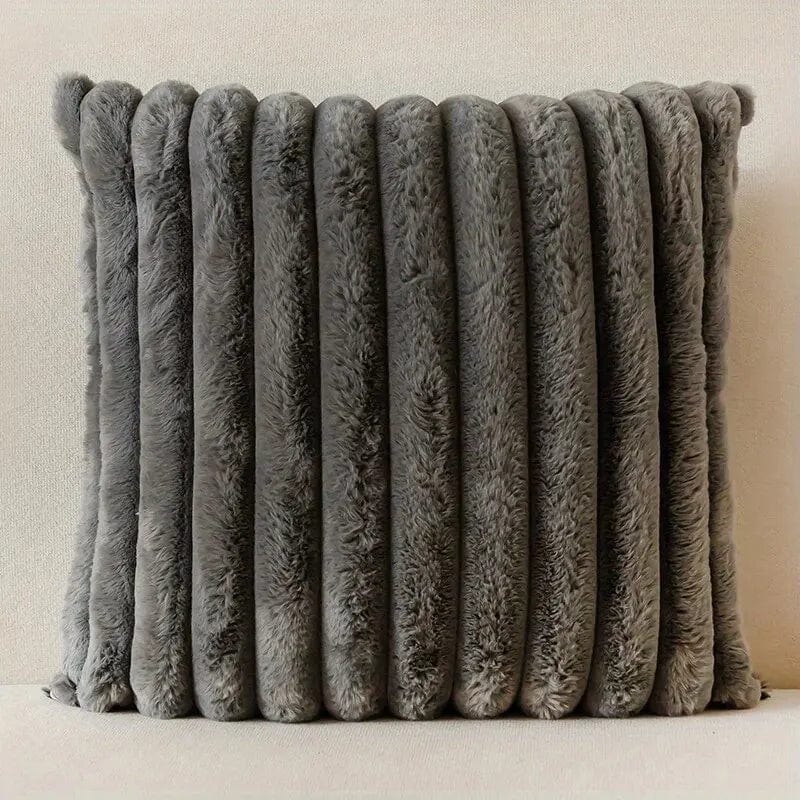 Taie d'oreiller rayée en tissu doux pour un look moderne et une ambiance cosy dans votre maison.
