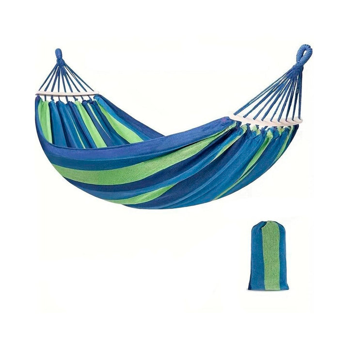 Hamac de camping en coton rayé bleu, ultra-confortable pour une détente ultime en extérieur ou au jardin.