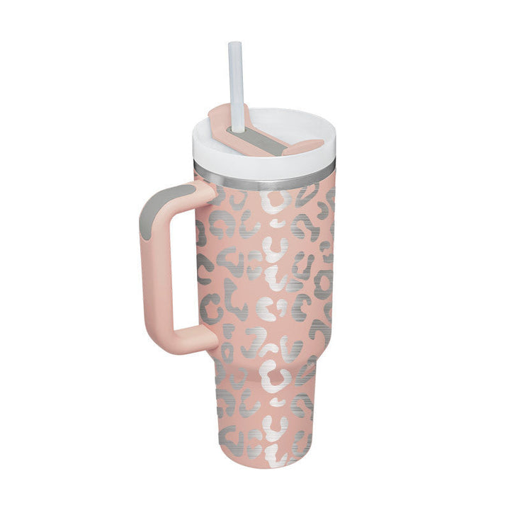 Grande tasse isotherme unisexe, avec paille et poignée pour un confort maximal.