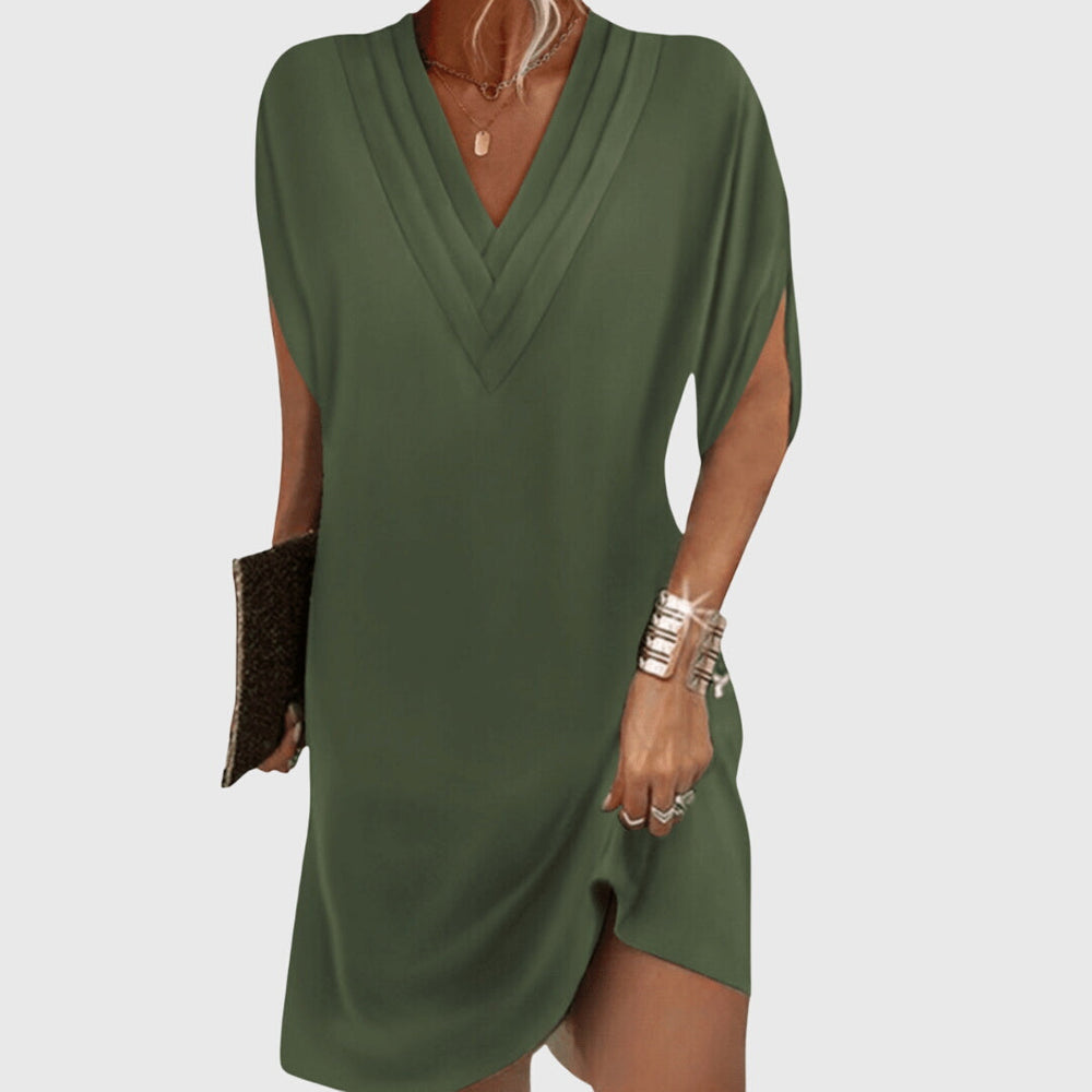 Robe fluide femme polyvalente et confortable, idéale pour look décontracté ou soirée. Effet amincissant garanti.