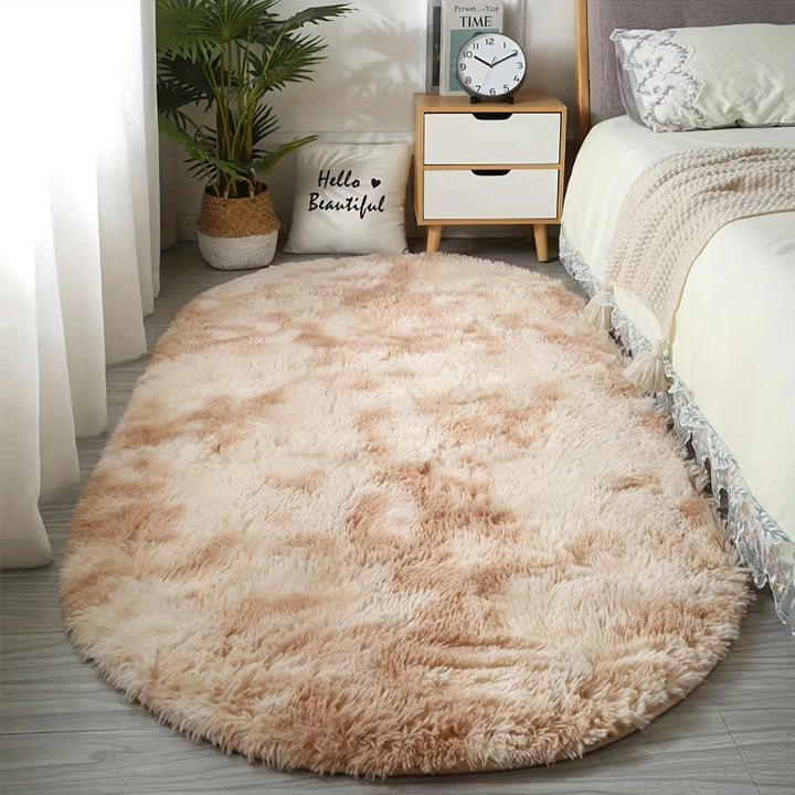 Tapis ovale moderne, doux et chic, parfait pour un salon design ou une chambre.
