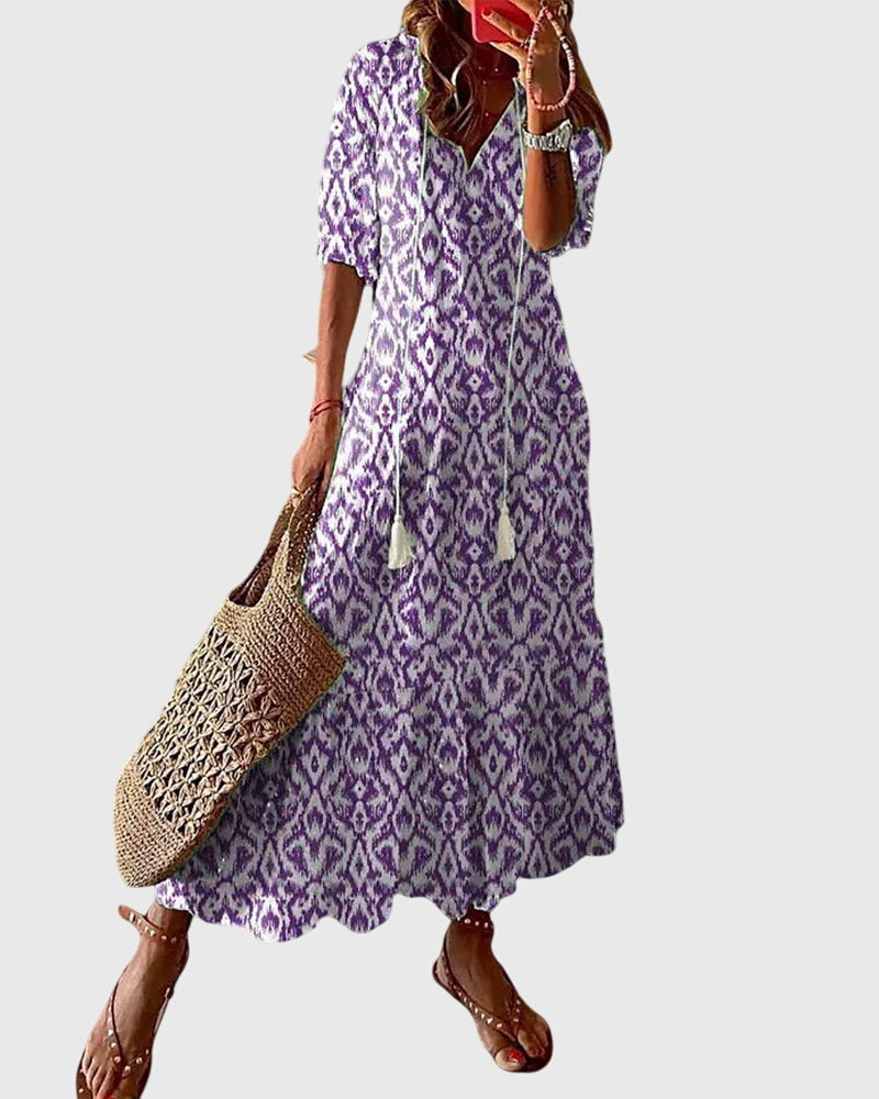Robe longue femme esprit vintage, imprimé floral, idéale pour l'été et les vacances à la plage.