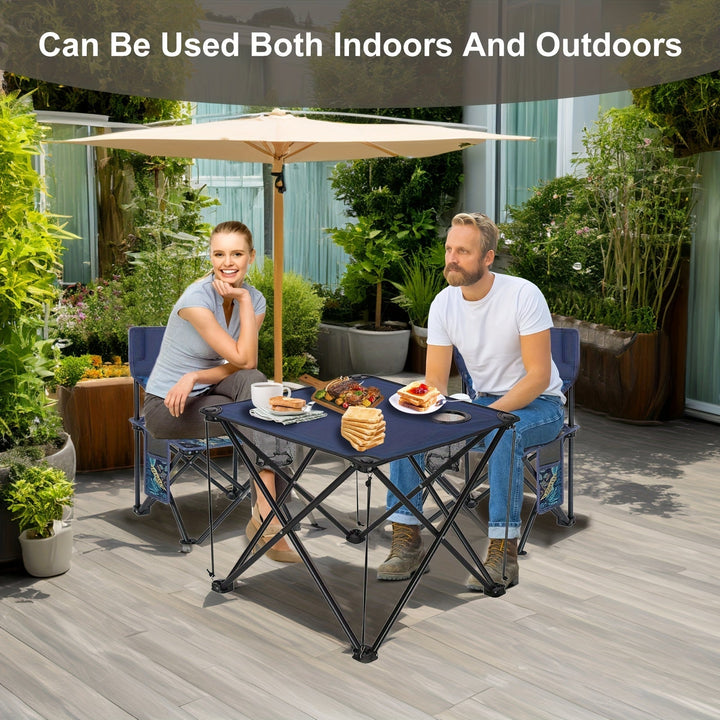 Table pliante en métal robuste et 4 chaises pliables en tissu Oxford gris, ensemble durable pour jardin et camping.