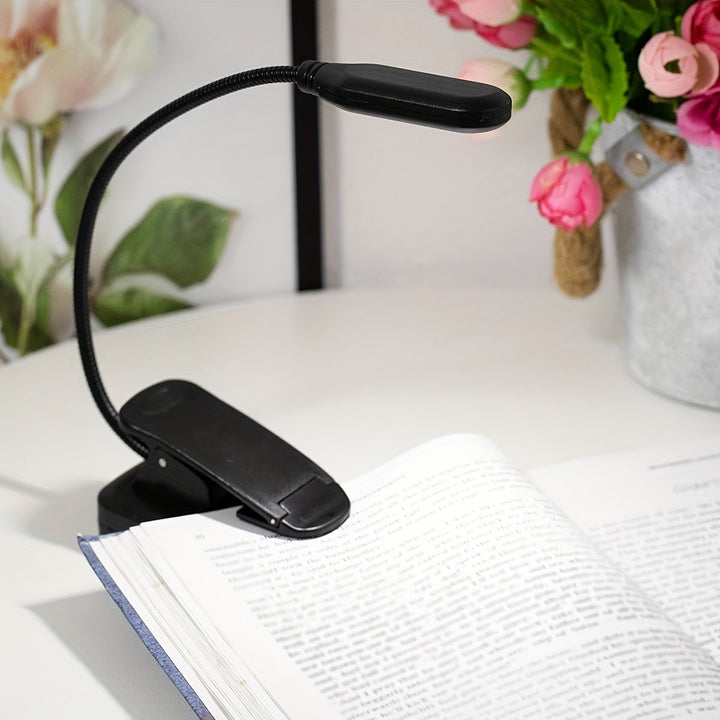 Pince-lampe de lecture sans fil, col flexible pour un réglage facile, accessoire essentiel pour lecteurs.
