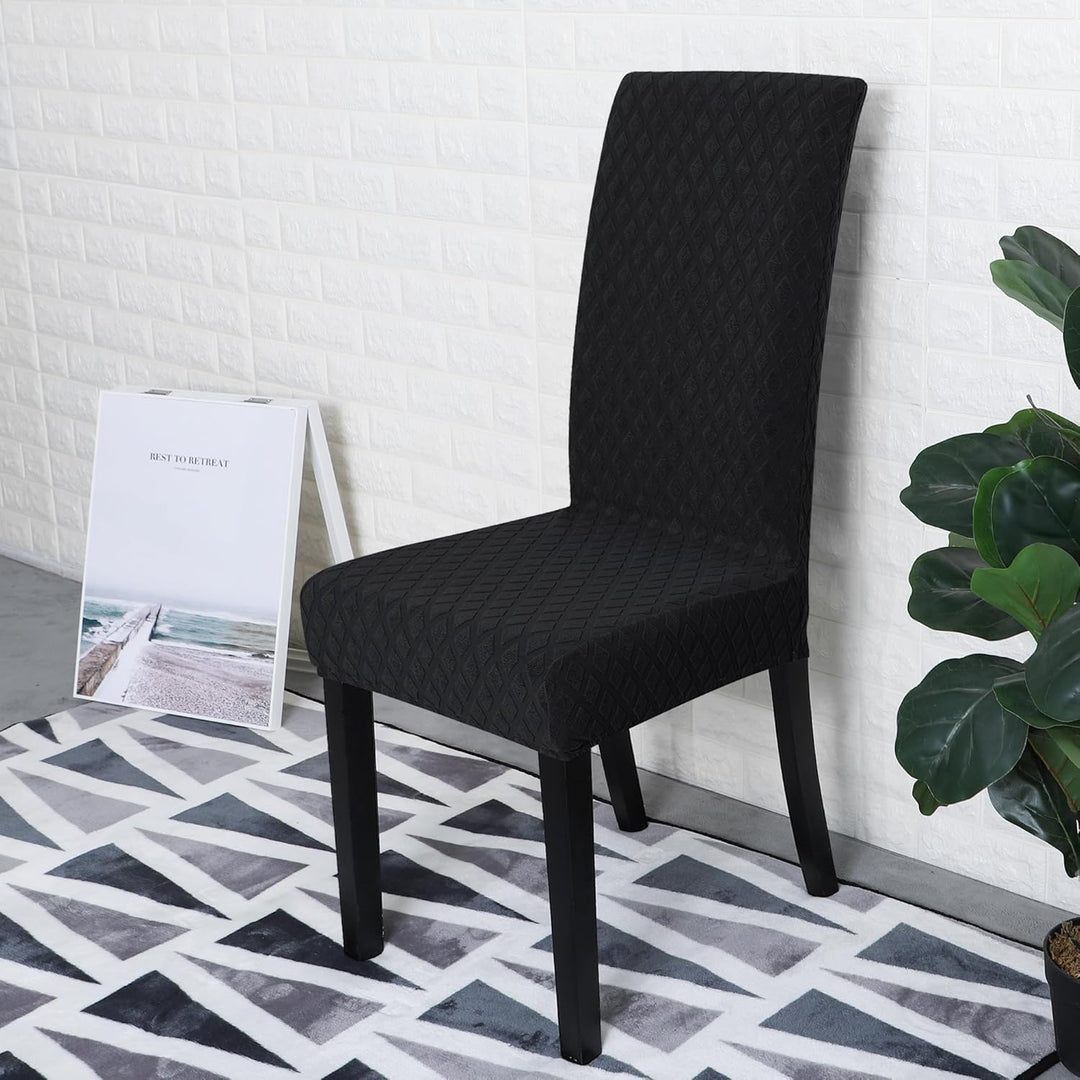 Vue détaillée: Tissu extensible et coutures de la housse de chaise motif diamant. Qualité polyester.