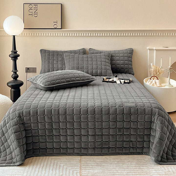 Couverture de lit texturée carrée, ultra douce, design élégant pour une chambre de luxe.