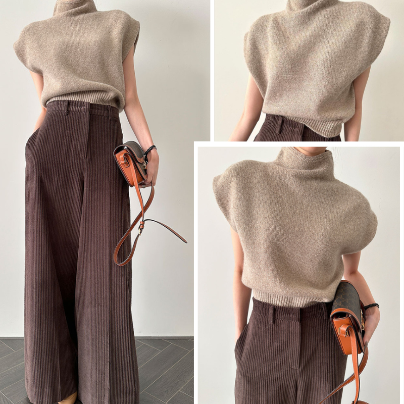 Mode femme: pull chic sans manches à col roulé, parfait pour tenue de bureau ou look décontracté élégant.