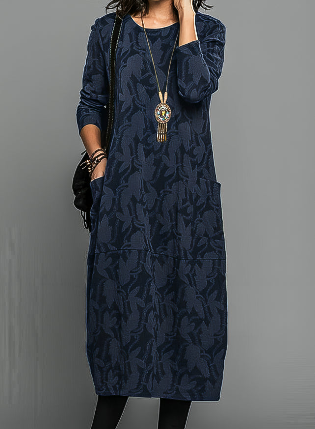 Vêtement femme chic et décontracté: cette robe midi ample à manches longues offre confort et style au quotidien.
