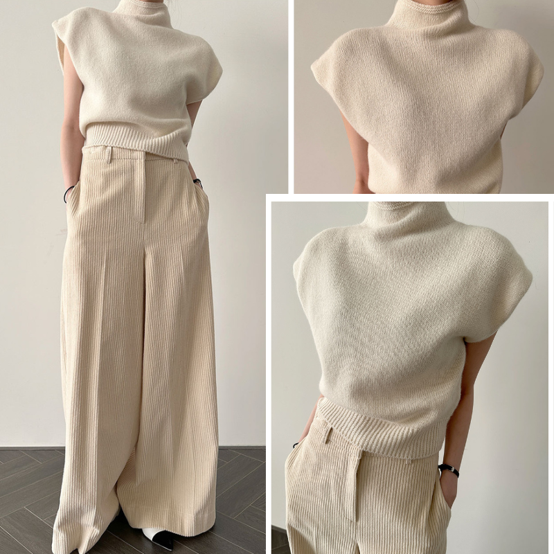 Vêtement féminin: pull à col roulé sans manches confortable et élégant. Idéal pour un style chic en toute saison.