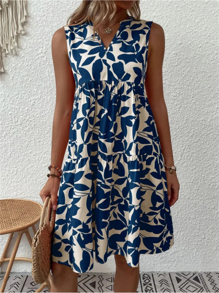 Robe midi évasée fleurie pour femme. Style élégant et léger, parfaite pour le confort estival.