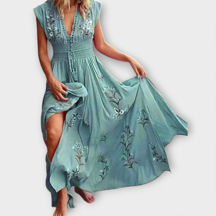 Robe Felizia bohème chic, broderie enchantée, apporte élégance et féminité à votre garde-robe d'été.