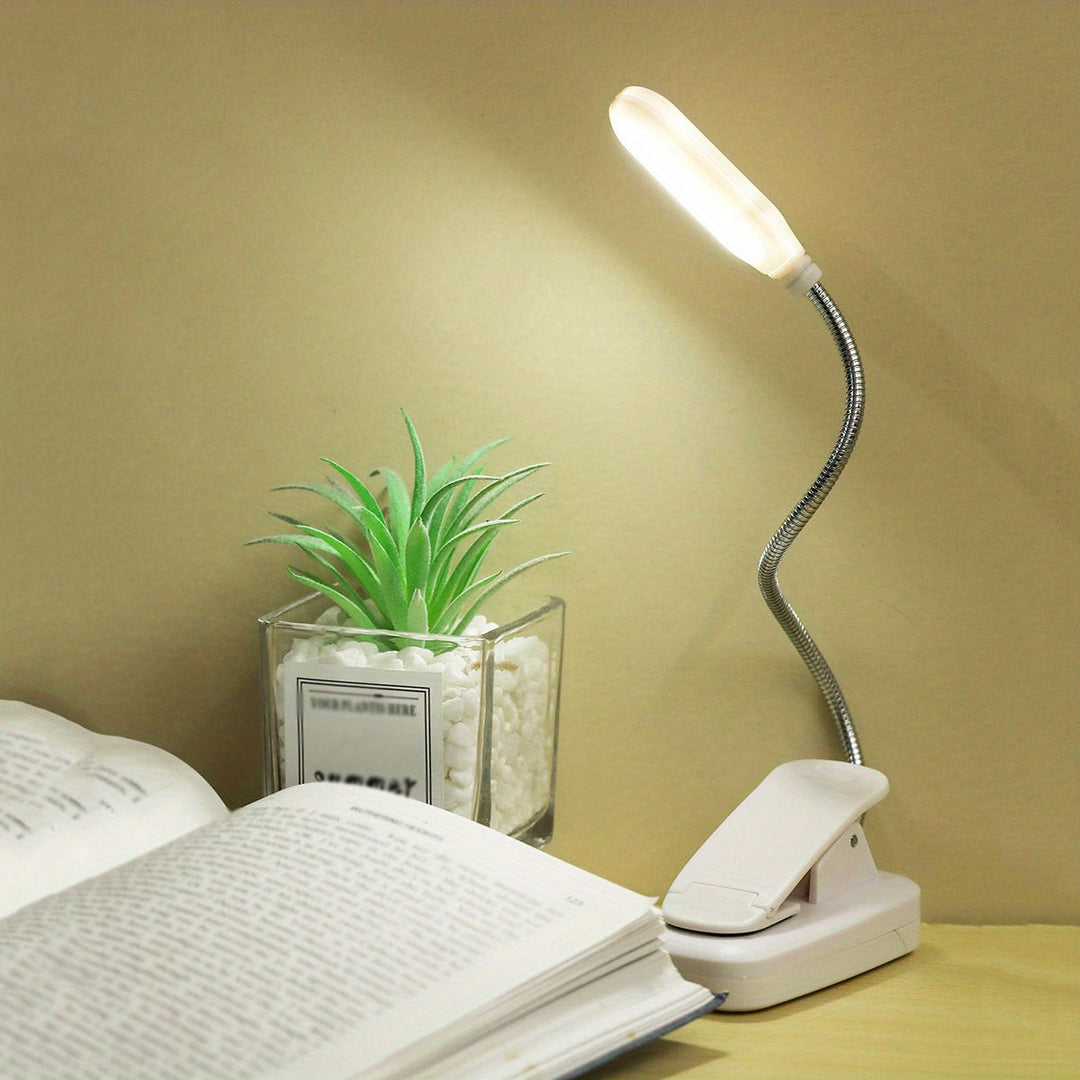 Lampe portable flexible avec pince, offrant un éclairage doux et directionnel pour vos activités de lecture.