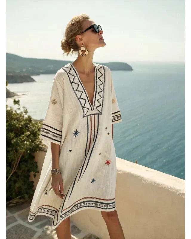 Robe mini kaftan femme à rayures, col V, manches courtes et coupe fluide, parfaite pour un style estival.