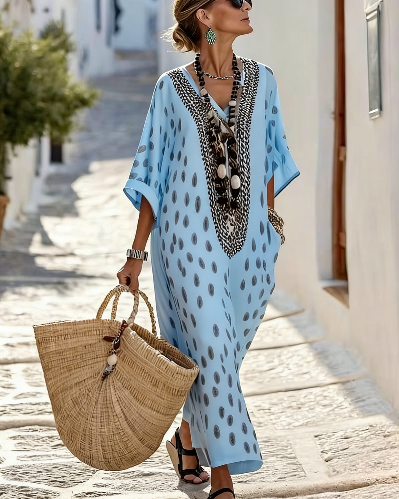 Kaftan maxi femme élégant avec broderie ethnique et motifs à pois. Parfait pour les vacances d'été.