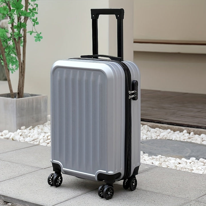 Valise de voyage compacte à 4 roulettes, facile à transporter, résistante aux chocs, voyage serein et organisé.