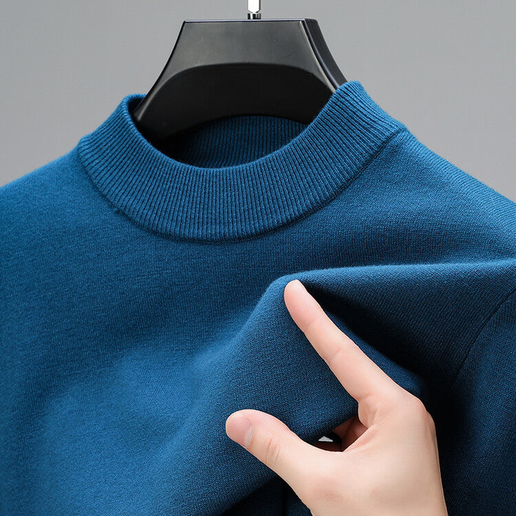 Vêtement homme confortable et chaud, ce pull est parfait pour un style décontracté en toute saison froide.