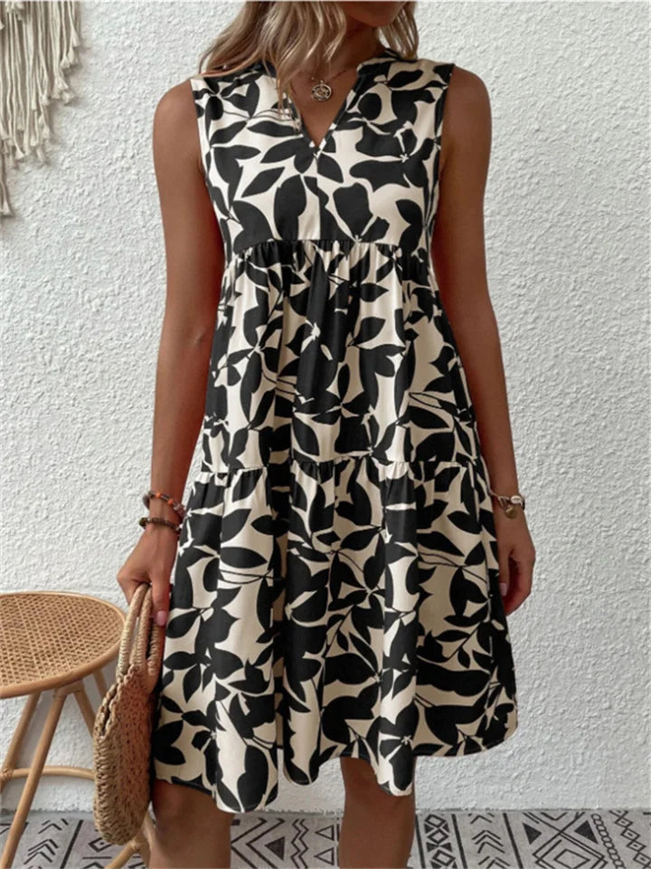 Robe midi élégante femme, motif fleuri, style polyvalent, parfaite pour un look décontracté ou chic en été.