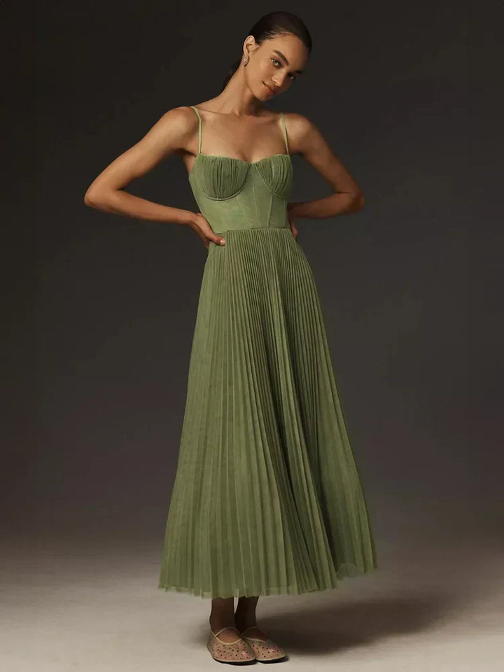 Robe midi femme élégante pour soirée, cocktail ou mariage. Style chic habillé avec corset plissé et jupe évasée.