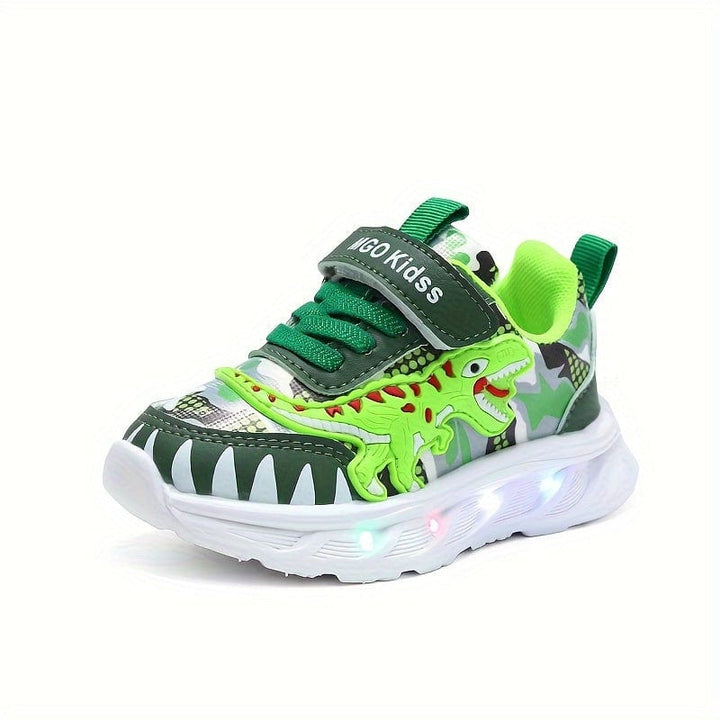 Baskets lumineuses pour garçons, motifs dinosaures et scratchs. Idéales pour le sport, mode enfant confortable.