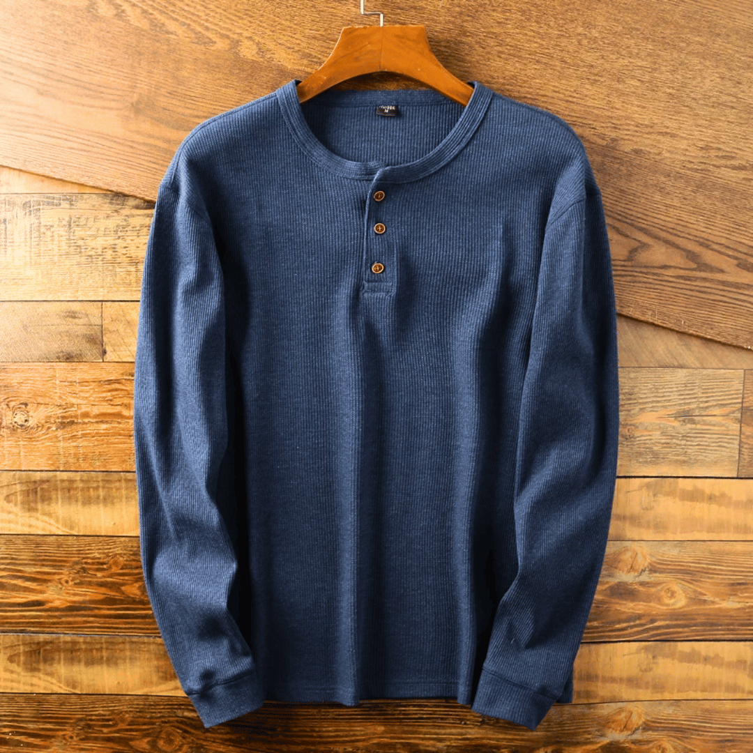 Pull Henley homme élégant, idéal pour une tenue polyvalente. Associe confort et style moderne.