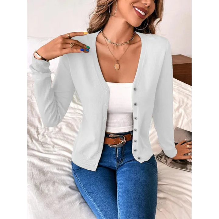 Gilet femme col V ajusté, pièce maîtresse mode polyvalente pour superposition quotidienne chic et confortable.