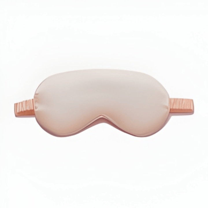 Masque de nuit en soie unisexe, pour des nuits réparatrices et un réveil frais et reposé.