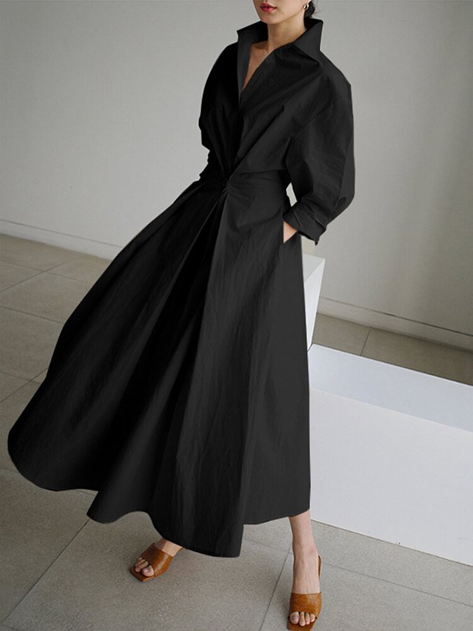 Détail: boutonnage élégant sur robe midi femme. Style chic et décontracté, idéal pour toute occasion, mode.