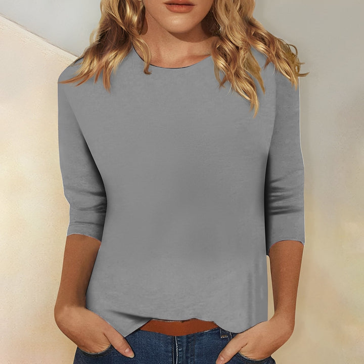 Haut femme facile à porter : T-shirt décontracté à manches 3/4, coupe ample pour un confort quotidien optimal.