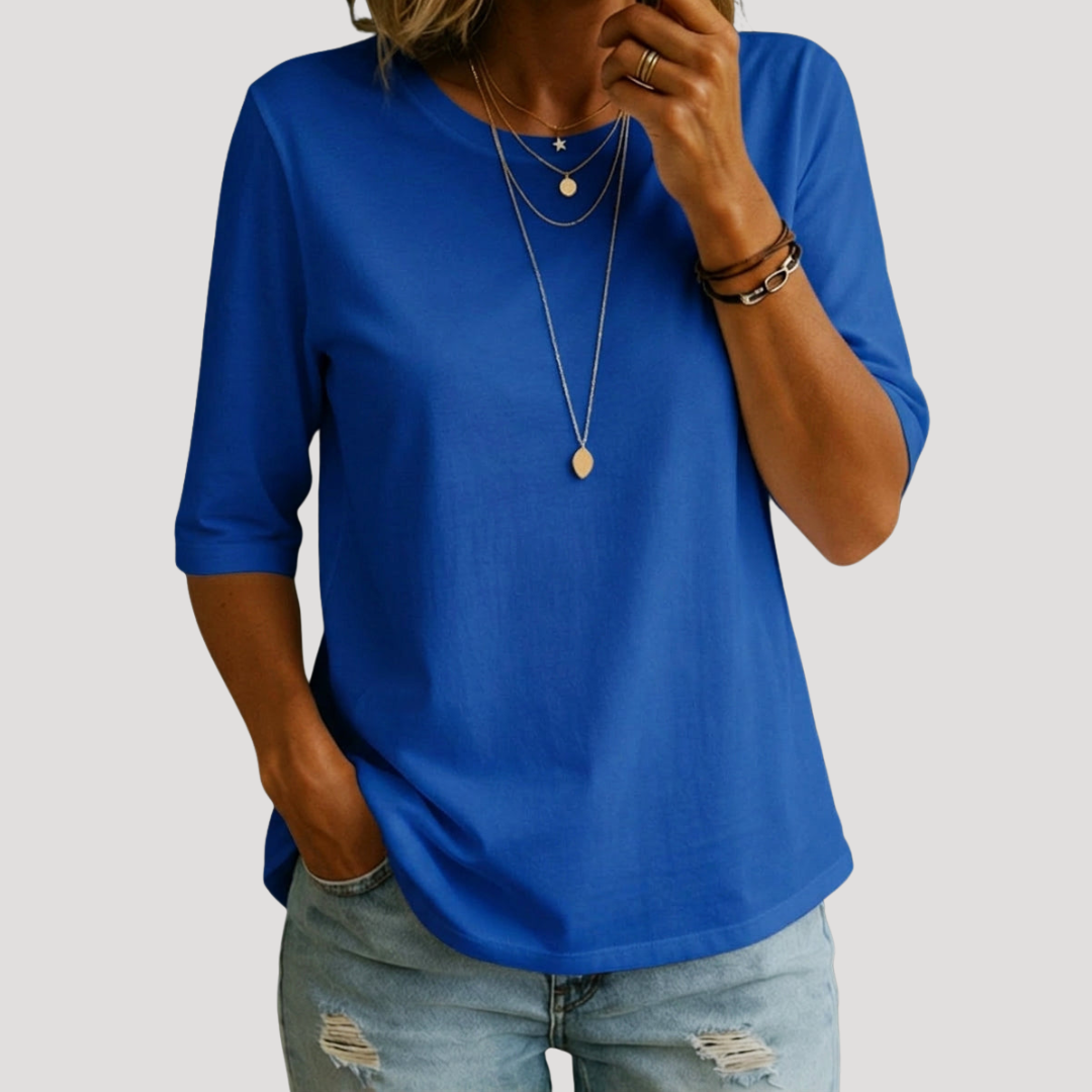 T-shirt femme col rond, manches 3/4, pour un look casual chic. Confort et élégance au quotidien.
