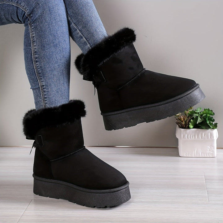 Bottes neige femme, style chic et grande adhérence. Des chaussures d'hiver confortables et sécurisées.