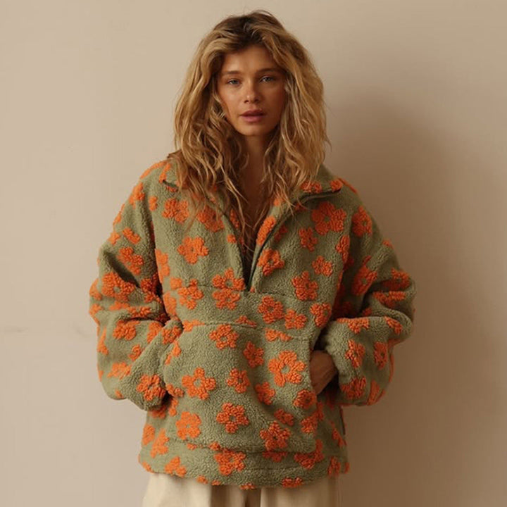 Dos du sweat-shirt zippé ample femme, tissu polaire chaud et doux, coupe décontractée élégante.