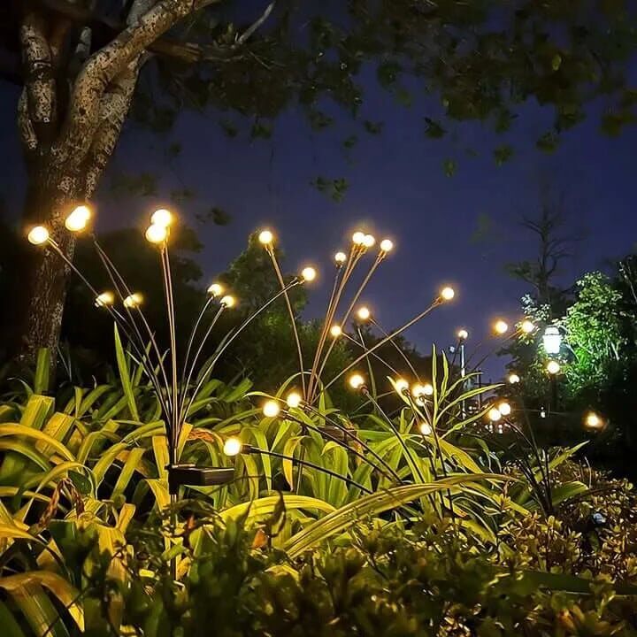 Lumière d'ambiance solaire LED jardin en forme de papillon pour une soirée féérique.