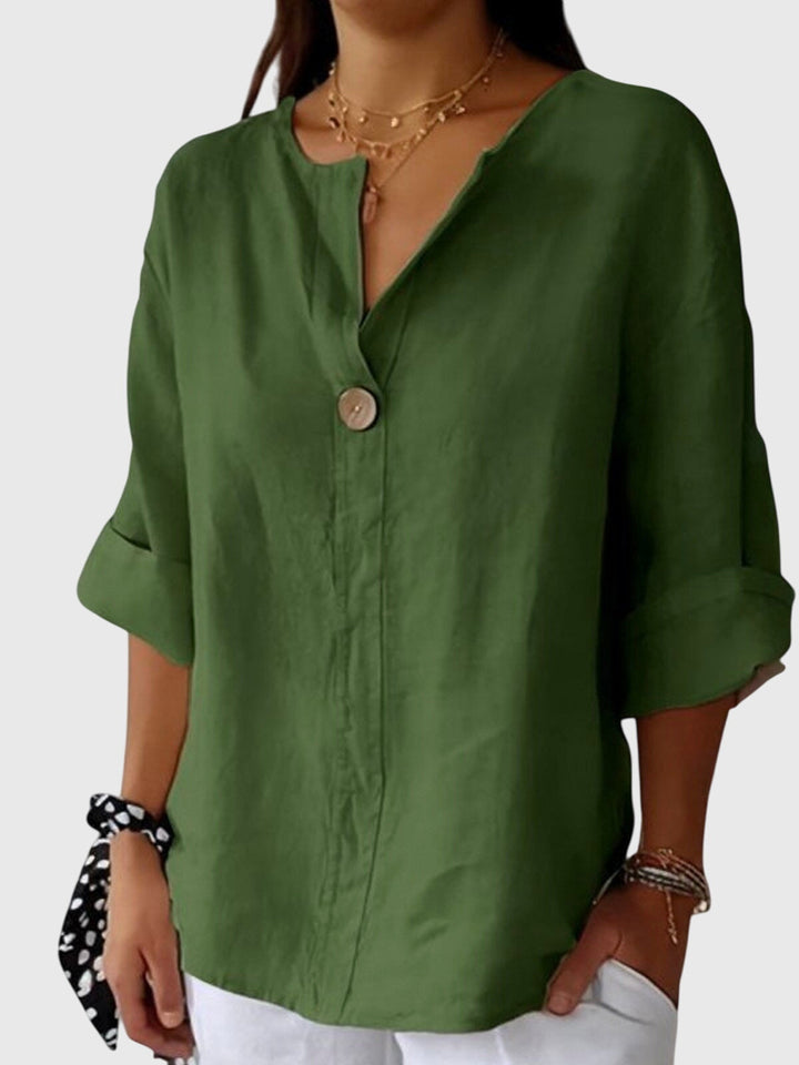Haut femme élégant et confortable. Cette blouse printanière apporte fraîcheur et style pour toute occasion de jour.