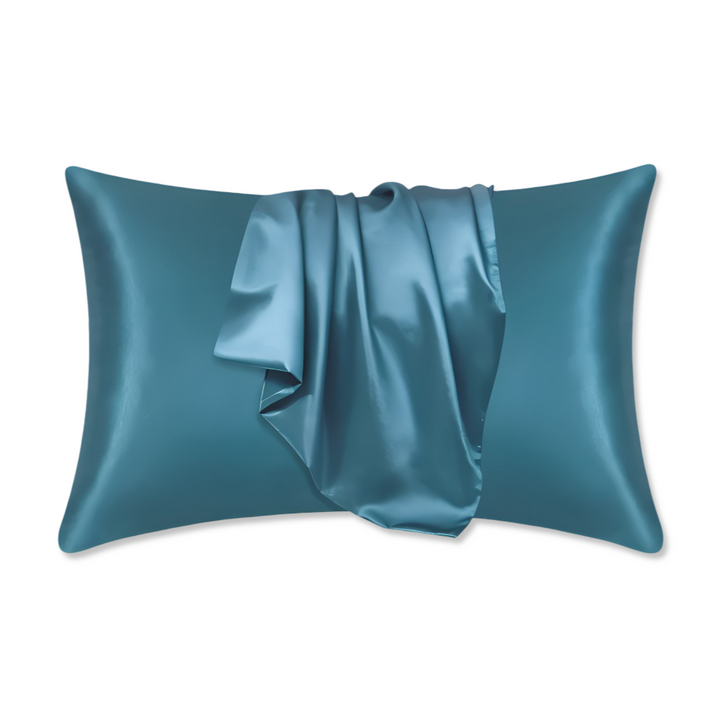 Housse d'oreiller durable en polyester uni, offre une protection longue durée.