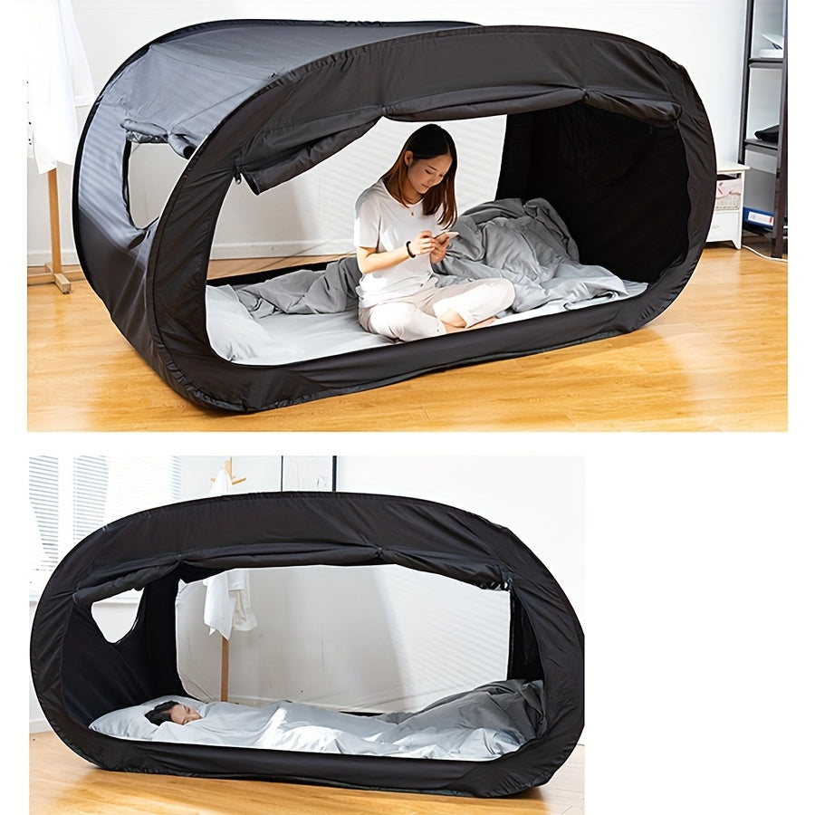 Lit de tente pliable noir, idéal pour camping, voyage et extérieur. Offre confort et protection contre insectes.