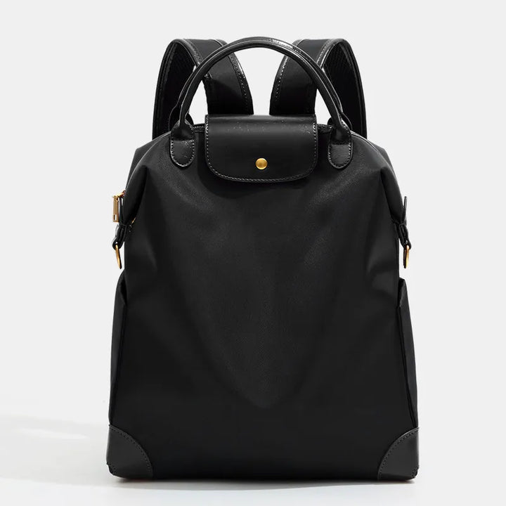 Sac à dos femme en cuir bicolore (taupe/crème), un accessoire polyvalent pour toute occasion chic.